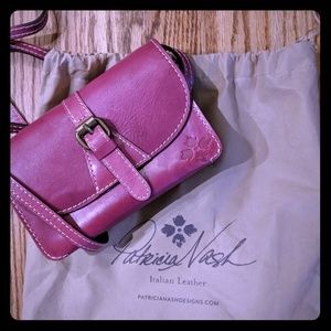 Patricia Nash leather crossbody in raspberry